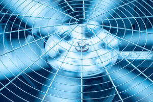 Air conditioning condenser fan spinning.