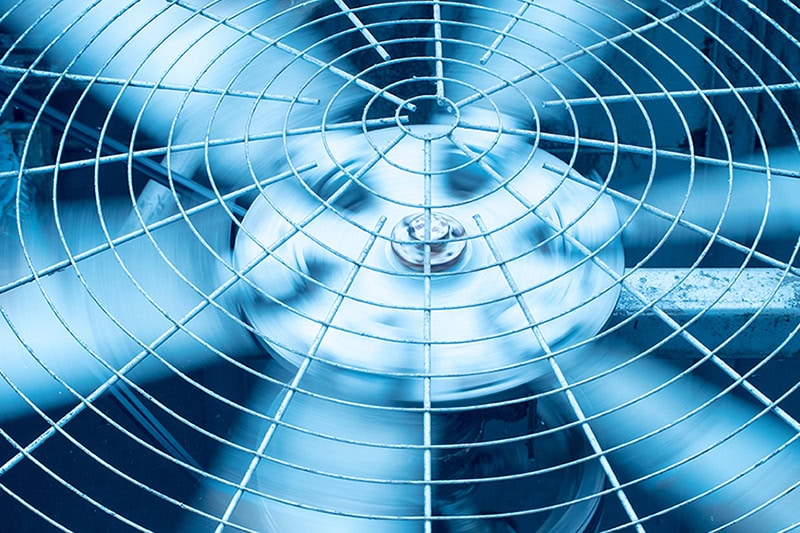 Close up of air conditioner unit blades.
